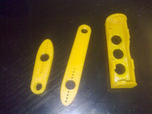 3D printed parts, Servo horns and Li-Ion holder. 